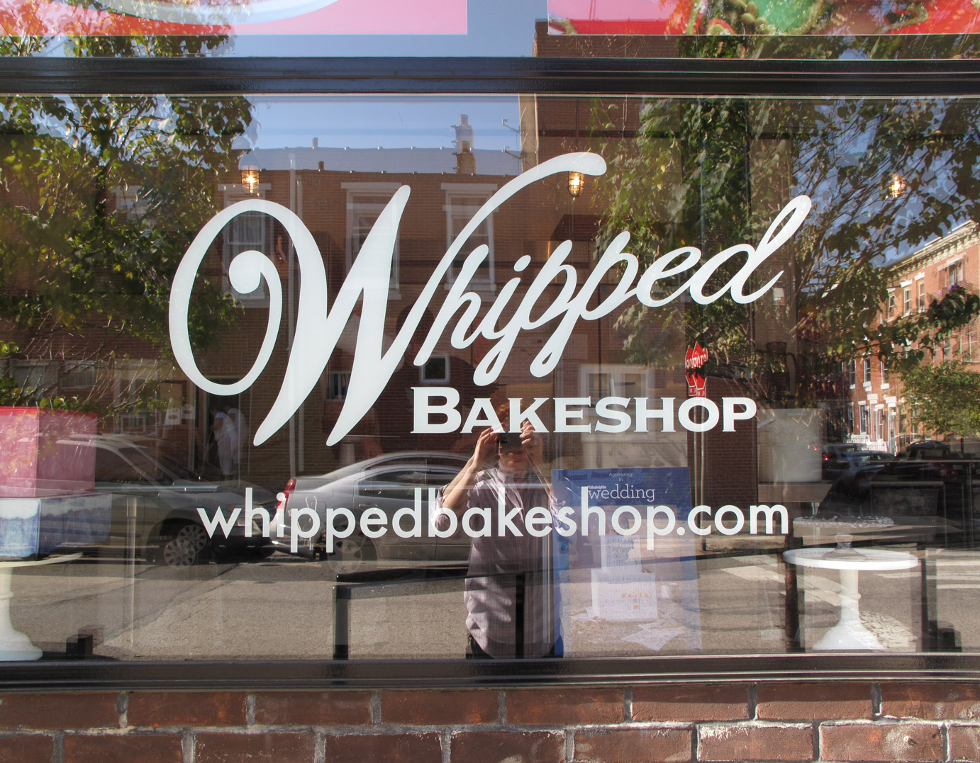 Whipped Bakeshop logo on store window